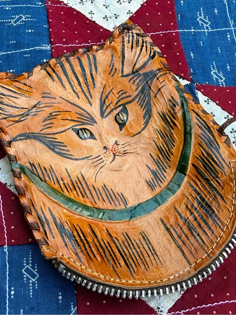 Vintage Brown Leather Cat Pouch with Green Collar Design